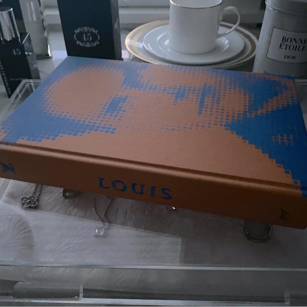 LOUIS BOOK FROM LOUIS VUITTON